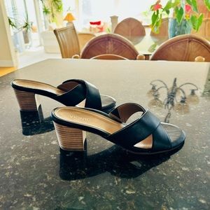 Black Vionic heeled sandals. Never worn and in excellent condition.